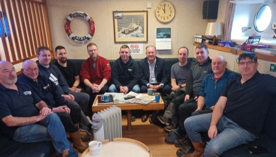 Head of industrial Micky Smyth (fifth from right) with members onboard RV Coryestes. Image: Nautilus International Image:Head of industrial Micky Smyth (fifth from right) with members onboard RV Coryestes. Image: Nautilus International